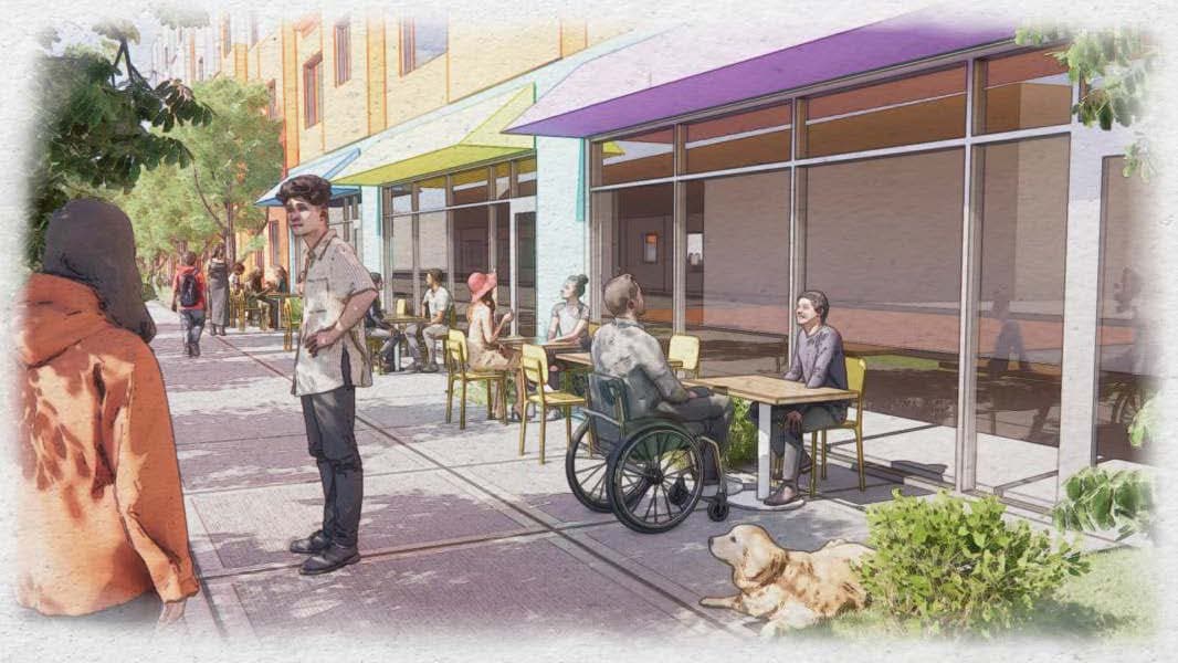 people on sidewalk in front of small storefronts with colorful awnings, including people standing, sitting, and in wheelchairs